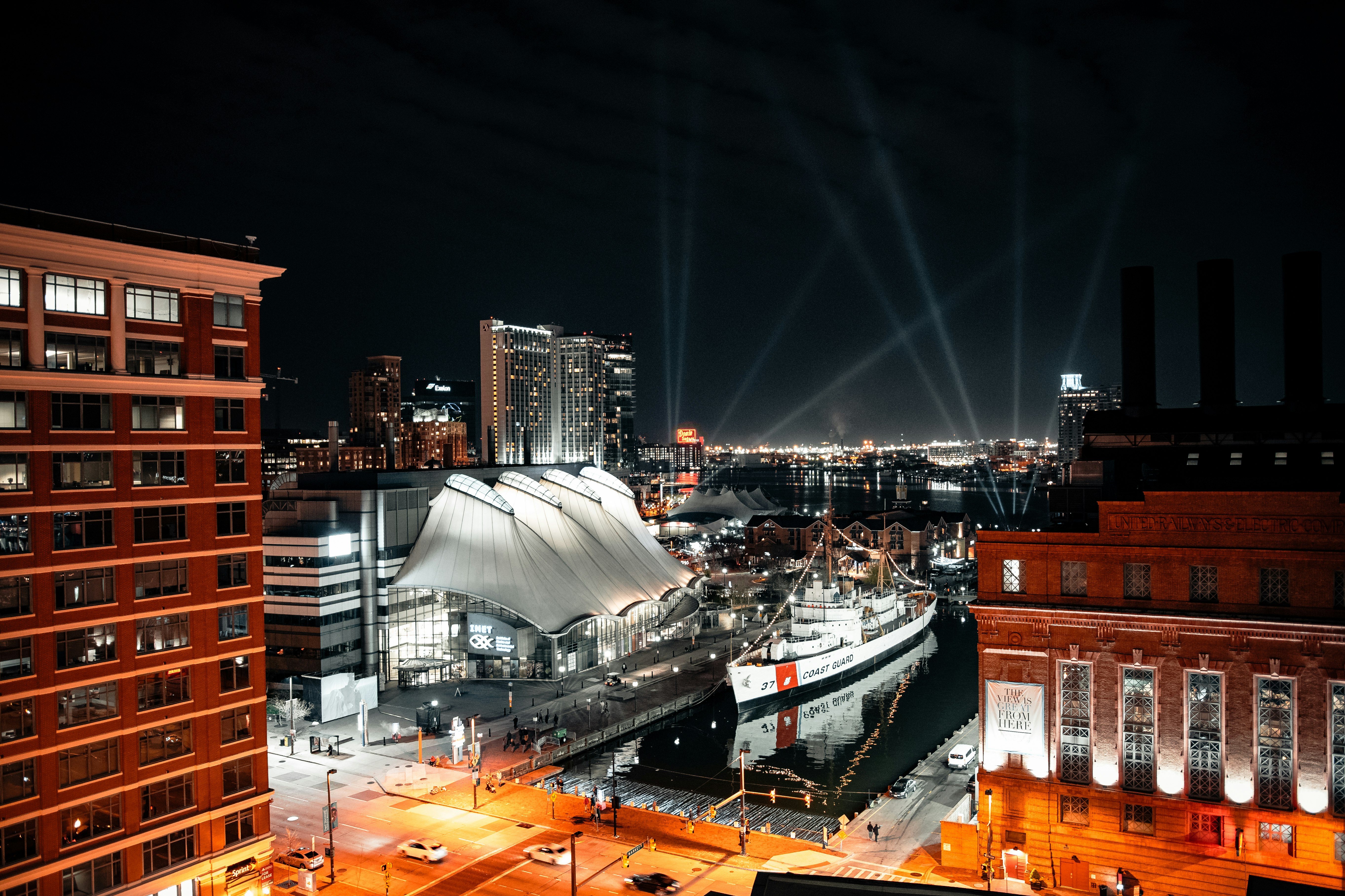 white and brown ship on dock during night time